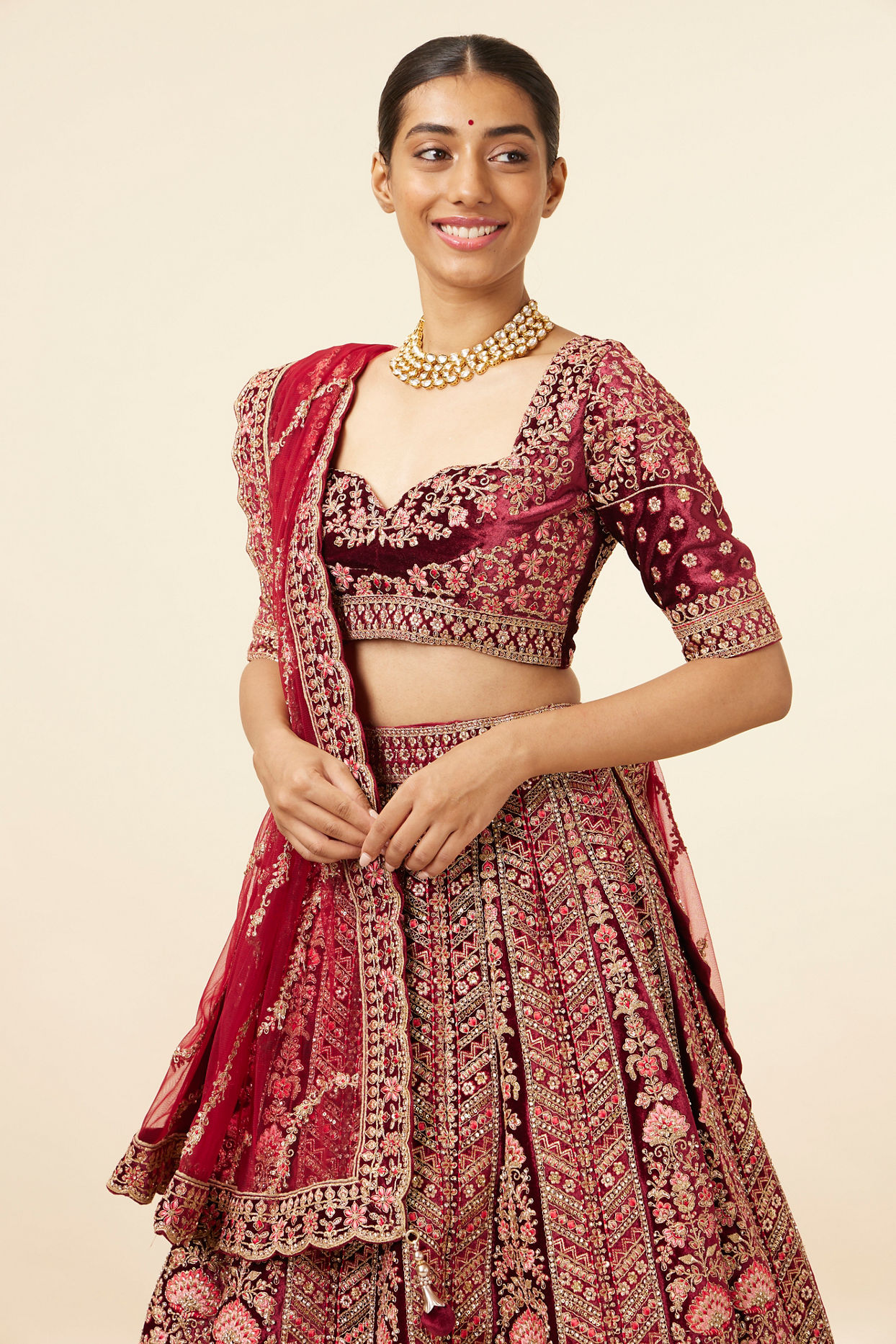 alt message - Mohey Women Maroon Embellished Bridal Lehenga image number 1